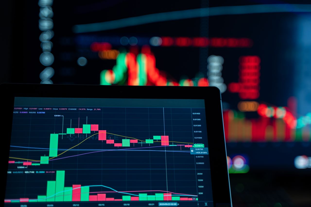 Services Close-up view of digital trading chart screen with vibrant graphs and data analysis.